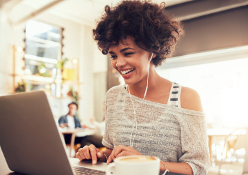 Young woman smiling on computer